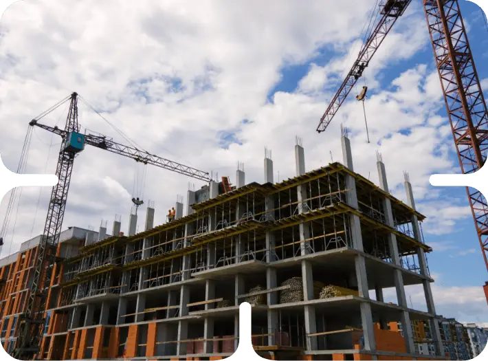 Construction site with cranes and scaffolding